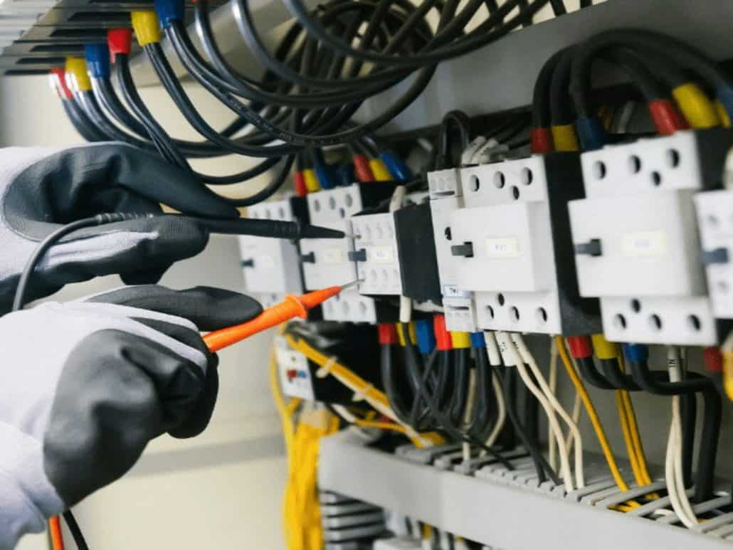 Electrical installation testing being carried out in a school building